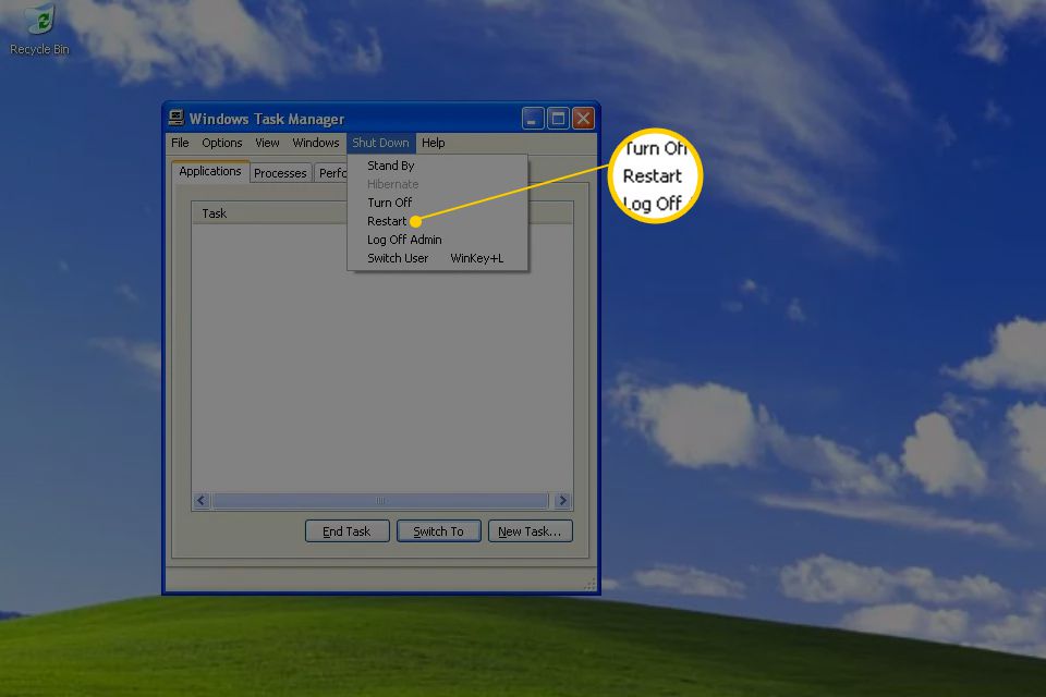 Captura de tela mostrando como reiniciar o Windows XP a partir do Gerenciador de Tarefas