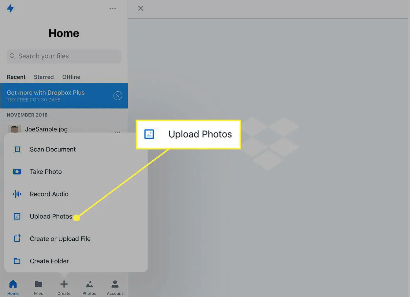 Uma captura de tela do aplicativo Dropbox com o botão Carregar fotos destacado