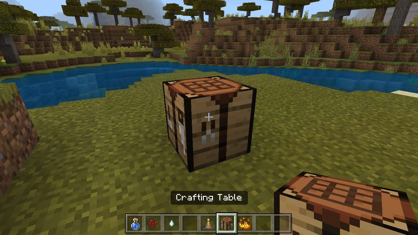 Coloque a Crafting Table no chão e abra-a para exibir a grade de crafting 3X3.