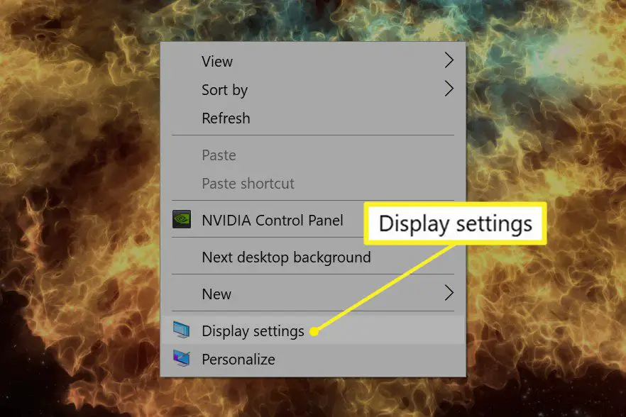 Área de trabalho do Windows com o menu do botão direito exibindo as configurações de exibição
