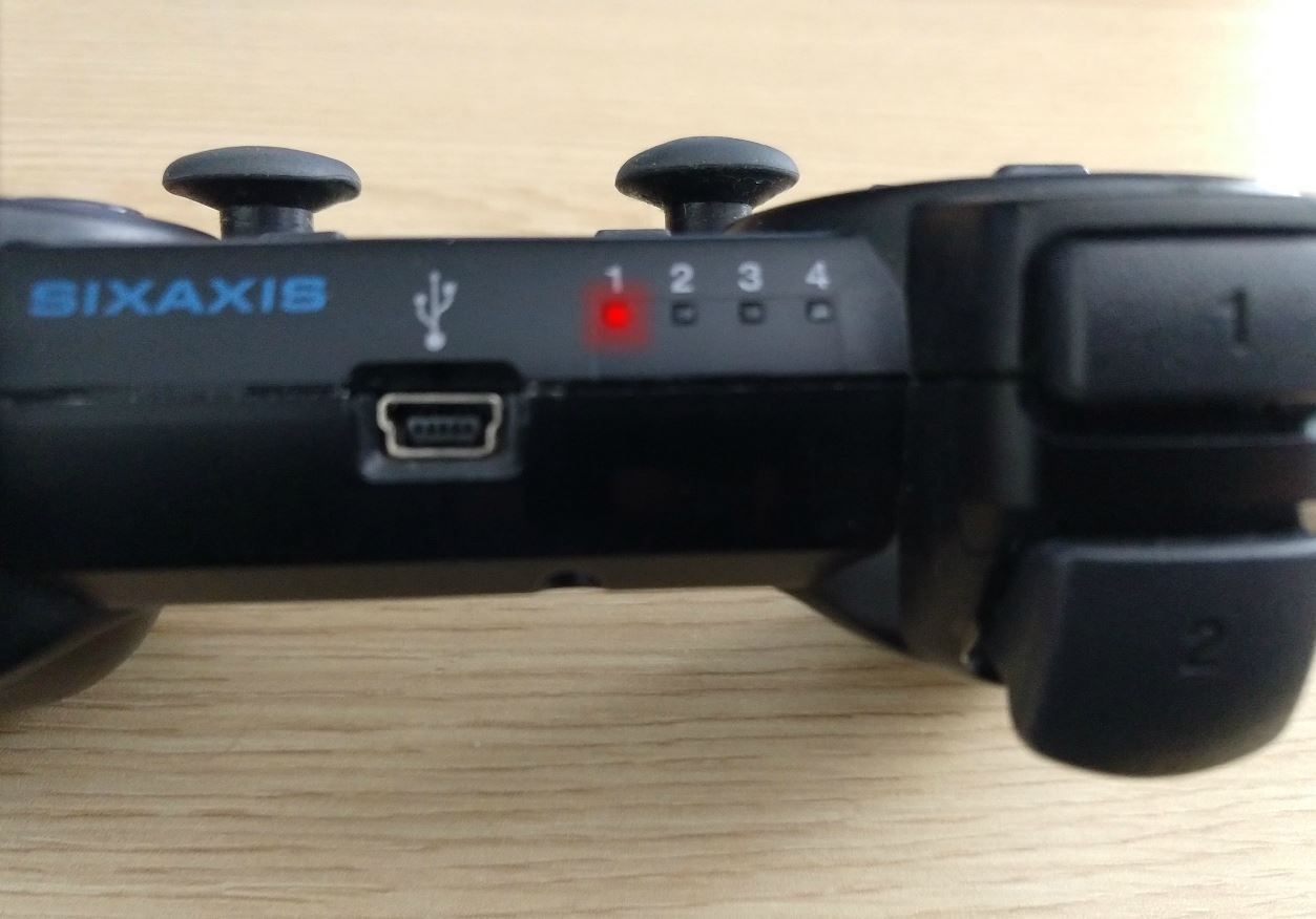 As luzes de sincronização exibidas em um controlador PS3