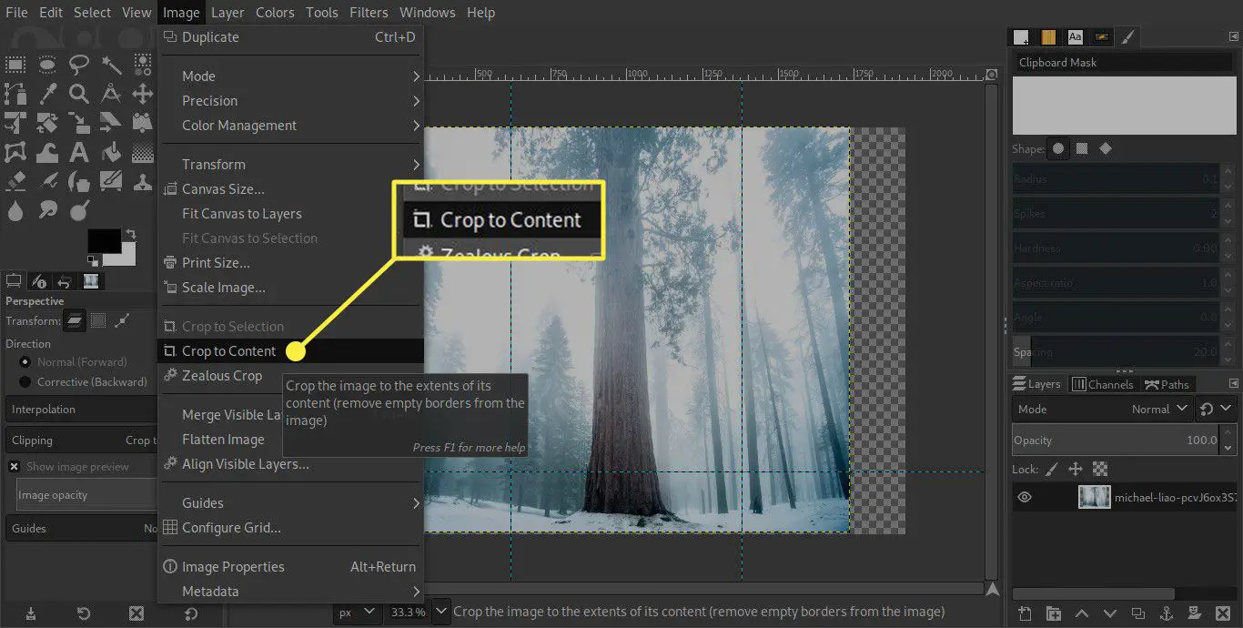 Uma captura de tela do GIMP com o comando "Cortar para conteúdo" destacado