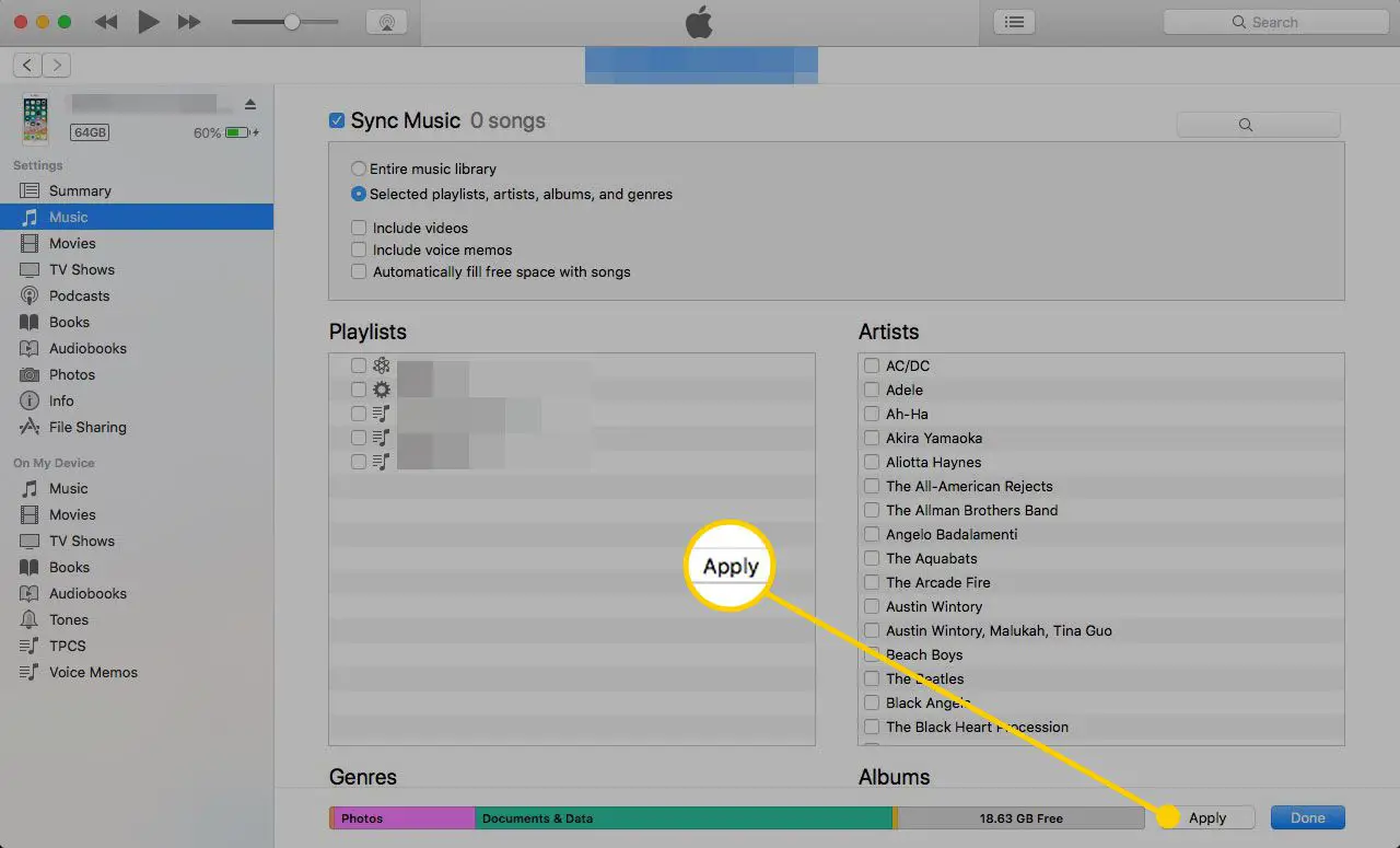 Configurações de música no iTunes com o botão Aplicar destacado