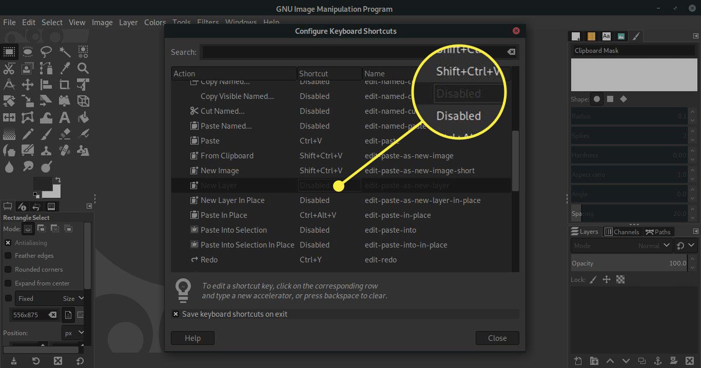 Uma captura de tela do GIMP "Configurar atalhos de teclado" tela com um status Desativado destacado